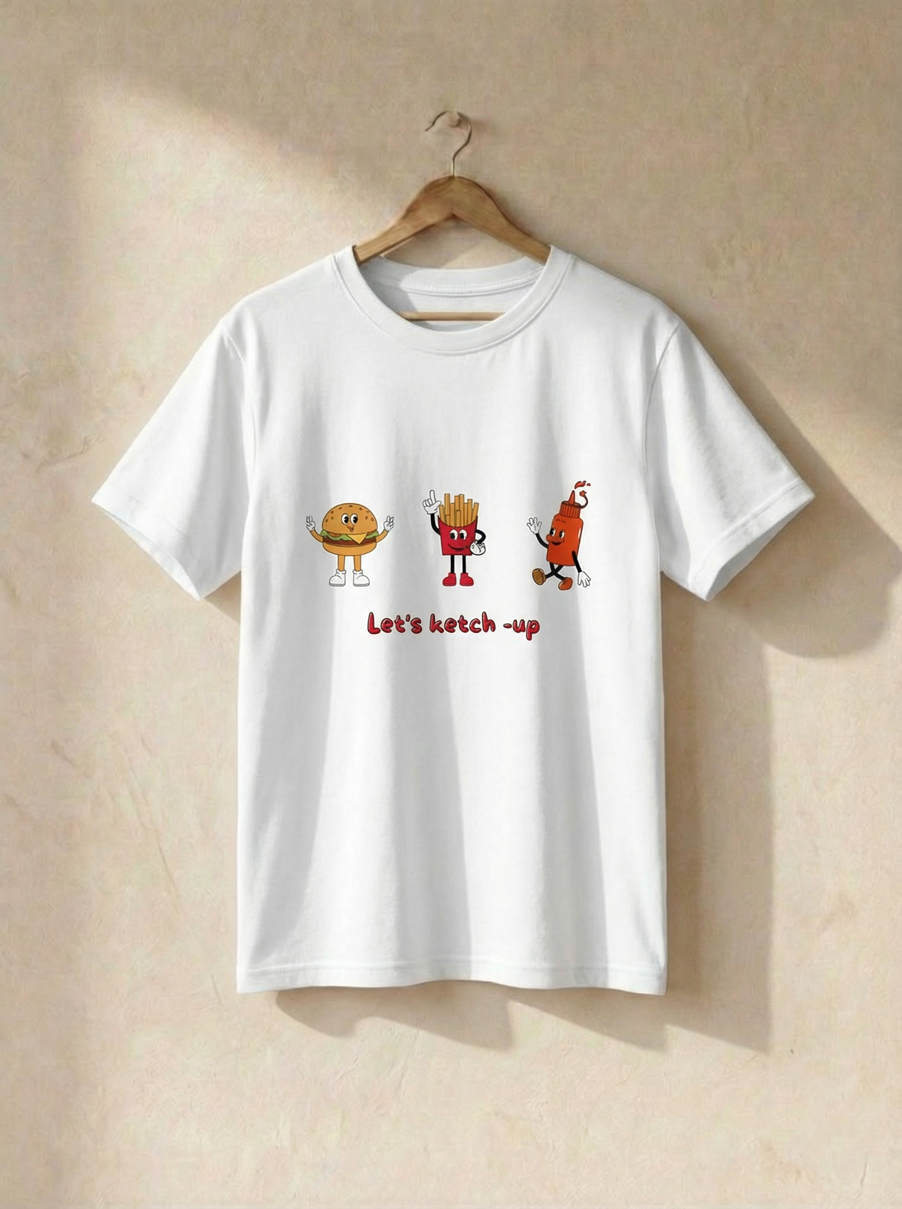 White t-shirt with cartoon characters and text on a beige background