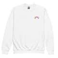 White sweatshirt with a rainbow and text design on a white background